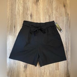 Black shorts high rise. Size XL belt ties has elastic waist.